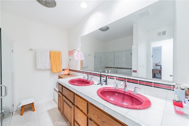 1855 Turnbull Canyon Rd, Hacienda Heights, CA 91745 - full bathroom with a stall shower, double vanity, and tile patterned floors
