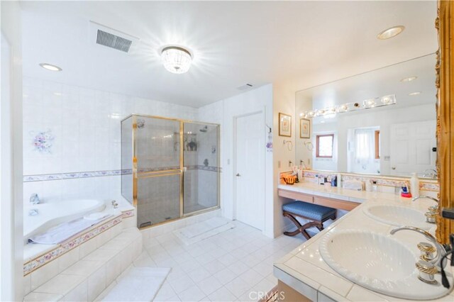 1855 Turnbull Canyon Rd, Hacienda Heights, CA 91745 - bathroom featuring double vanity, tile patterned flooring, a bath, a stall shower, and recessed lighting