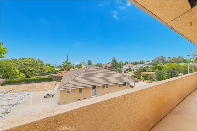 1855 Turnbull Canyon Rd, Hacienda Heights, CA 91745 - view of side of property featuring stucco siding, a balcony, and a tile roof