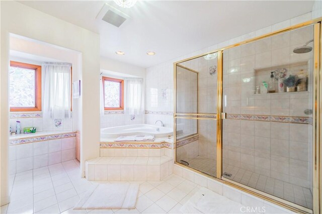 1855 Turnbull Canyon Rd, Hacienda Heights, CA 91745 - full bath featuring a bath, tile patterned flooring, a shower stall, and recessed lighting