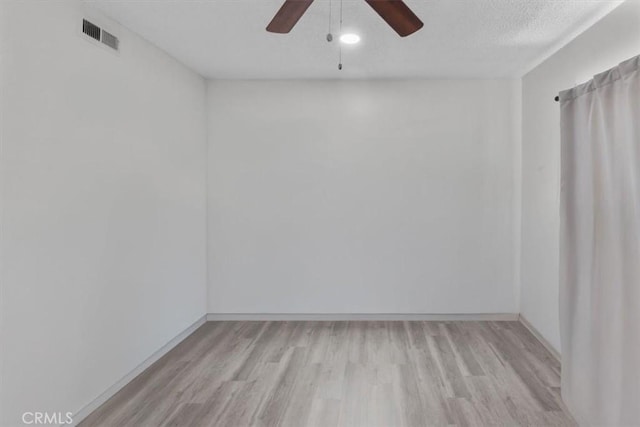 12912 Lariat Ln, Norwalk, CA 90650 - spare room with light wood-style floors, a ceiling fan, and baseboards
