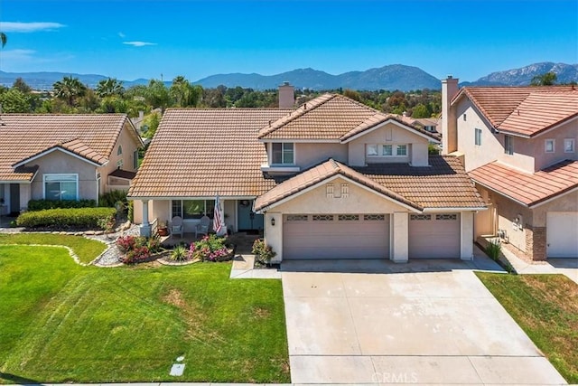 32091 Camino Nunez, Temecula, CA 92592 - view of front of property featuring a tile roof, stucco siding, a mountain view, and concrete driveway