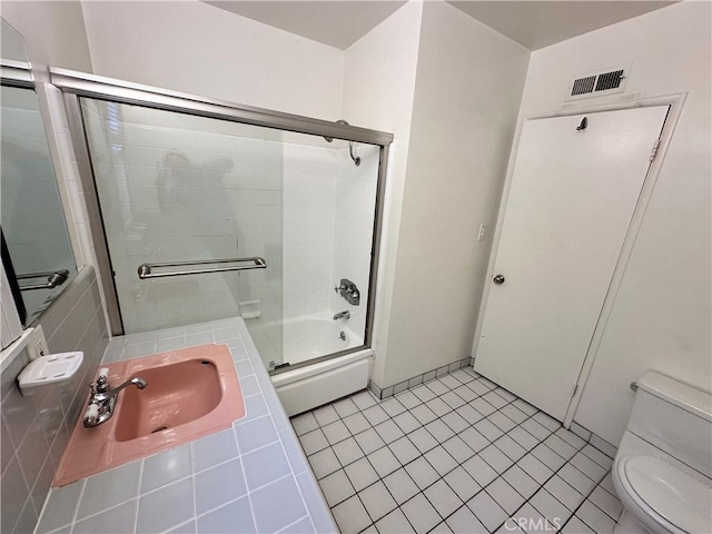 14655 Morrison St, Sherman Oaks, CA 91403 - full bath with shower / bath combination with glass door and tile patterned flooring
