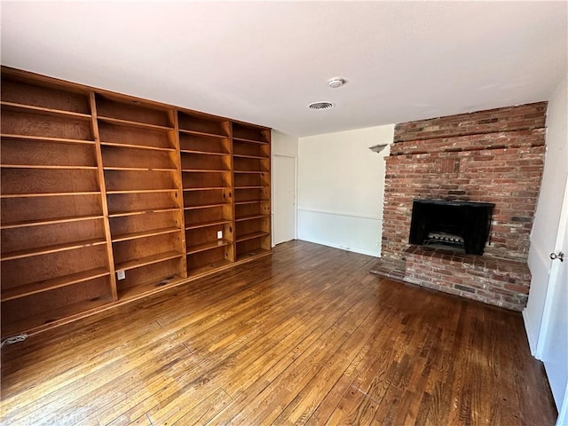 14655 Morrison St, Sherman Oaks, CA 91403 - unfurnished living room with wood-type flooring and a fireplace