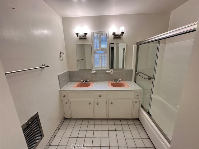 14655 Morrison St, Sherman Oaks, CA 91403 - bathroom with backsplash, bath / shower combo with glass door, double vanity, and tile patterned flooring