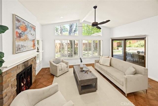 925 Calle Hermosa, San Dimas, CA 91773 - tiled living area featuring a ceiling fan, plenty of natural light, and a stone fireplace