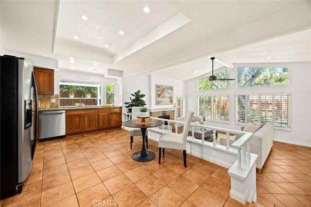 925 Calle Hermosa, San Dimas, CA 91773 - kitchen featuring stainless steel appliances, brown cabinetry, light tile patterned floors, open floor plan, and recessed lighting