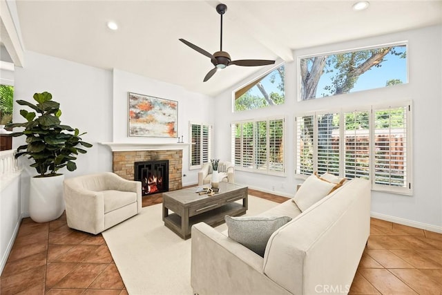 925 Calle Hermosa, San Dimas, CA 91773 - tiled living room featuring a ceiling fan, plenty of natural light, a stone fireplace, beamed ceiling, and recessed lighting