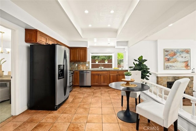 925 Calle Hermosa, San Dimas, CA 91773 - kitchen featuring stainless steel appliances, brown cabinets, recessed lighting, and light tile patterned floors