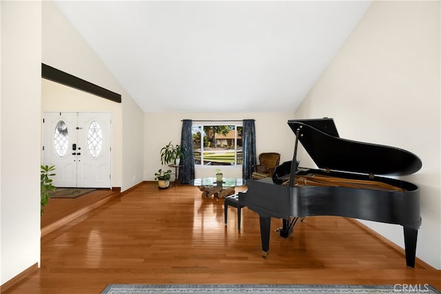 251 Miramar St, Upland, CA 91784 - living area featuring vaulted ceiling, wood finished floors, and baseboards