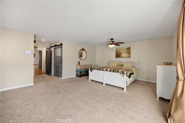 251 Miramar St, Upland, CA 91784 - bedroom with a barn door, light colored carpet, baseboards, a ceiling fan, and recessed lighting