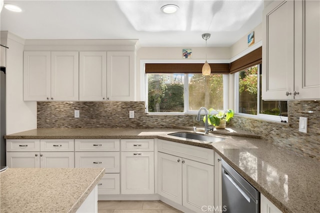 251 Miramar St, Upland, CA 91784 - kitchen featuring a sink, dishwasher, tasteful backsplash, and light stone counters