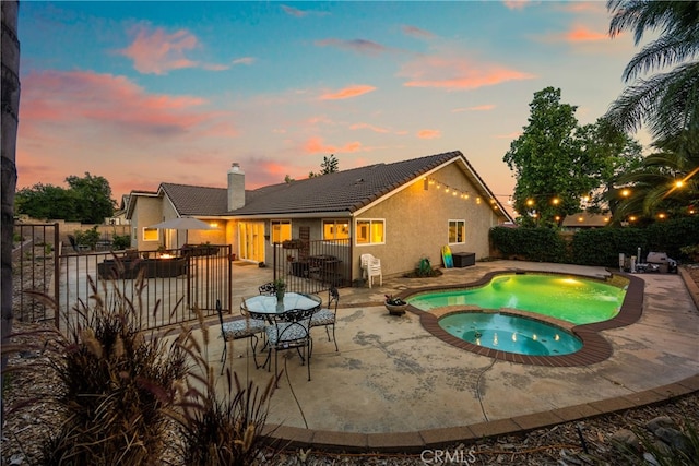 251 Miramar St, Upland, CA 91784 - view of swimming pool featuring a patio area, a pool with connected hot tub, and a fenced backyard