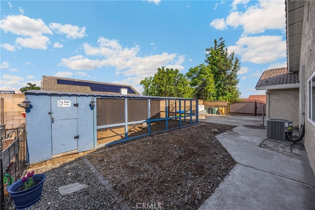 251 Miramar St, Upland, CA 91784 - fenced backyard with central air condition unit, an outdoor structure, and a patio area