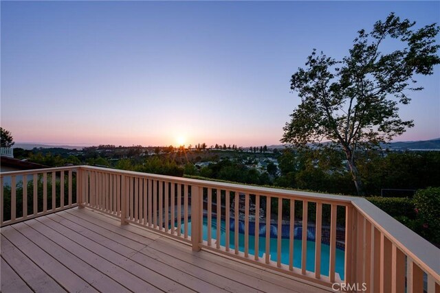27591 Cenajo, Mission Viejo, CA 92691 - deck at dusk with an outdoor pool