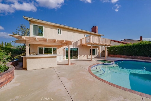 27591 Cenajo, Mission Viejo, CA 92691 - view of pool featuring stairway, a patio area, a pool with connected hot tub, and a wooden deck