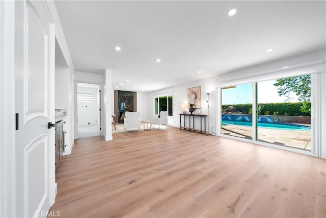 27591 Cenajo, Mission Viejo, CA 92691 - unfurnished living room featuring light wood-style flooring and recessed lighting