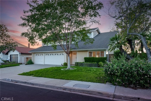 27591 Cenajo, Mission Viejo, CA 92691 - view of front of property with driveway, a yard, an attached garage, and a tile roof