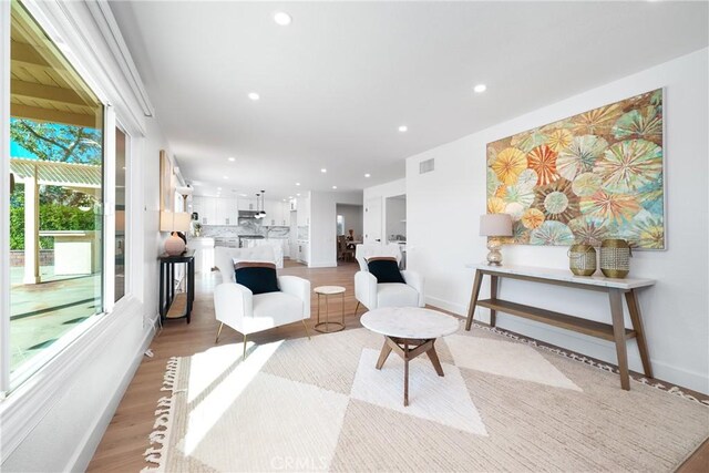27591 Cenajo, Mission Viejo, CA 92691 - living area with recessed lighting and light wood-style floors
