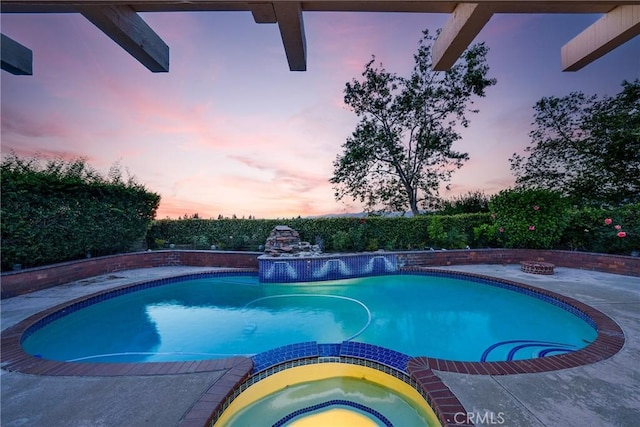 27591 Cenajo, Mission Viejo, CA 92691 - pool at dusk featuring a pool with connected hot tub