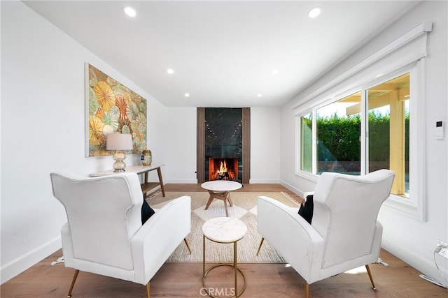 27591 Cenajo, Mission Viejo, CA 92691 - living area featuring a high end fireplace, recessed lighting, wood finished floors, and baseboards