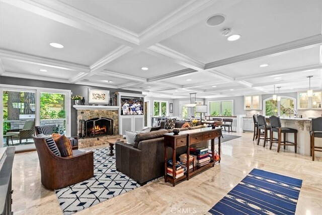 27833 Hamiltair Dr, Lake Arrowhead, CA 92352 - living room featuring healthy amount of natural light, a stone fireplace, coffered ceiling, beamed ceiling, and recessed lighting