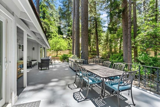 27833 Hamiltair Dr, Lake Arrowhead, CA 92352 - view of patio / terrace featuring outdoor dining area and view of wooded area