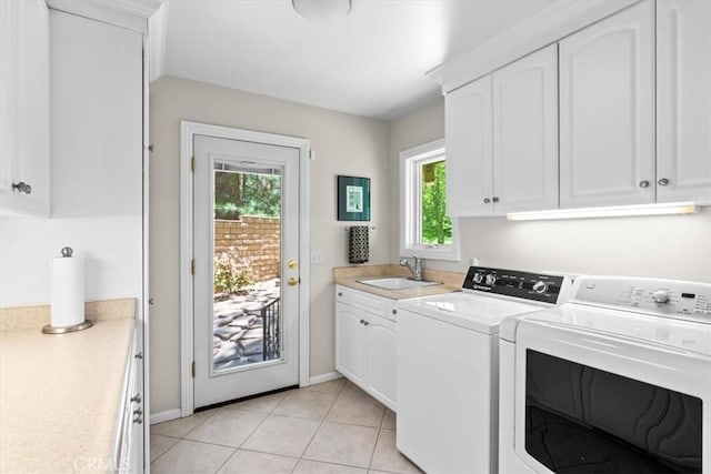 27833 Hamiltair Dr, Lake Arrowhead, CA 92352 - laundry area featuring washing machine and dryer, cabinet space, baseboards, and light tile patterned floors