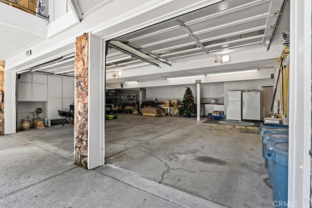 27833 Hamiltair Dr, Lake Arrowhead, CA 92352 - garage featuring freestanding refrigerator