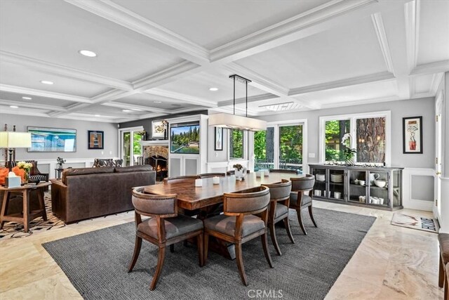 27833 Hamiltair Dr, Lake Arrowhead, CA 92352 - dining space with coffered ceiling, a lit fireplace, recessed lighting, and beamed ceiling