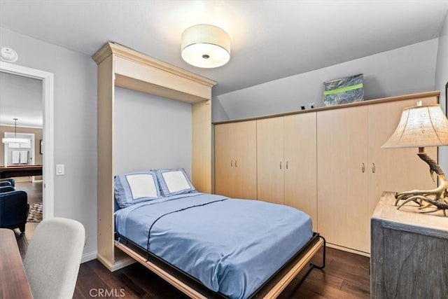 27833 Hamiltair Dr, Lake Arrowhead, CA 92352 - bedroom featuring dark wood finished floors and a closet