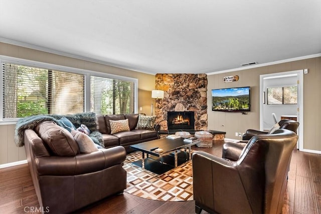 27833 Hamiltair Dr, Lake Arrowhead, CA 92352 - living area with ornamental molding, dark wood-style flooring, and a fireplace