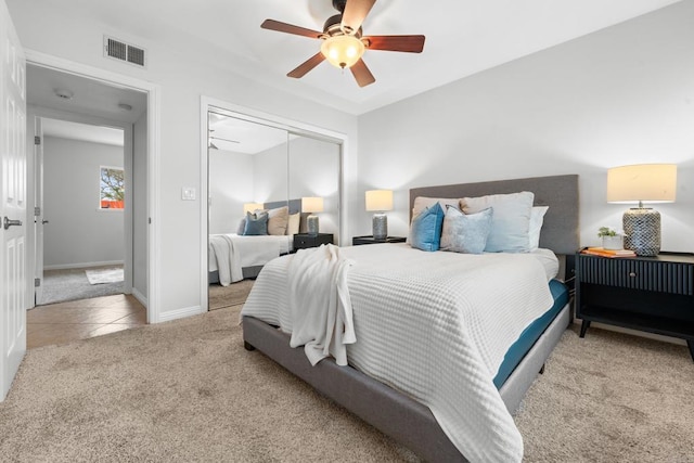 1409 Taft St, Escondido, CA 92026 - tiled bedroom featuring carpet, a closet, baseboards, and ceiling fan