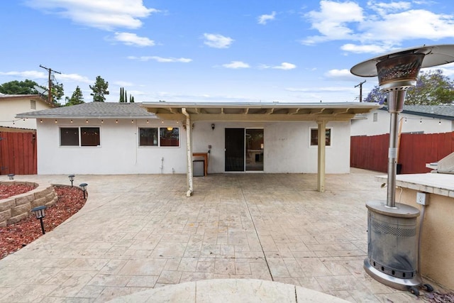 1409 Taft St, Escondido, CA 92026 - back of property with stucco siding and a patio