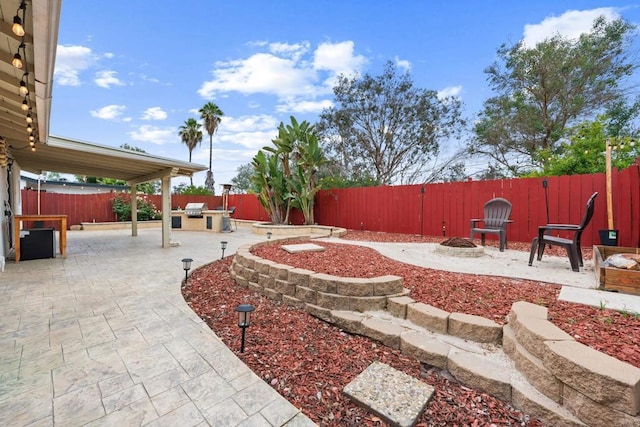 1409 Taft St, Escondido, CA 92026 - fenced backyard featuring a fire pit and a patio