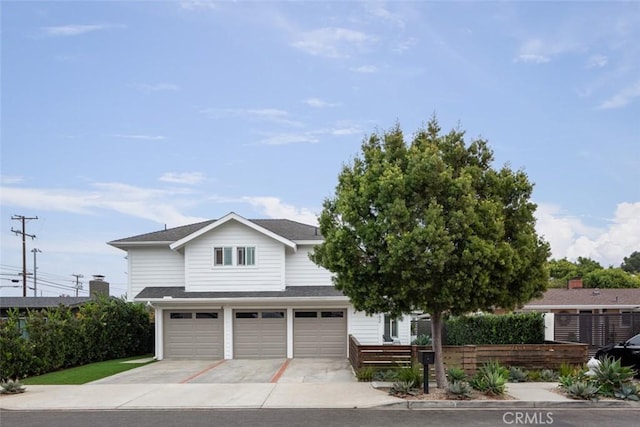 1792 Kenwood Pl, Costa Mesa, CA 92627 - view of front of property with an attached garage, concrete driveway, and a shingled roof