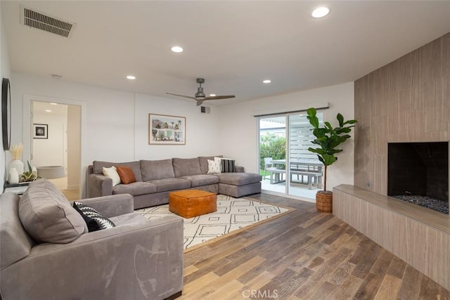 1792 Kenwood Pl, Costa Mesa, CA 92627 - living room featuring a ceiling fan, wood finished floors, recessed lighting, and a large fireplace