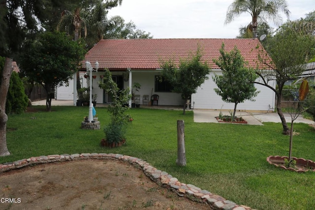 6232 Country View Ln, Riverside, CA 92504 - view of front facade featuring a tiled roof, driveway, a front lawn, and an attached garage