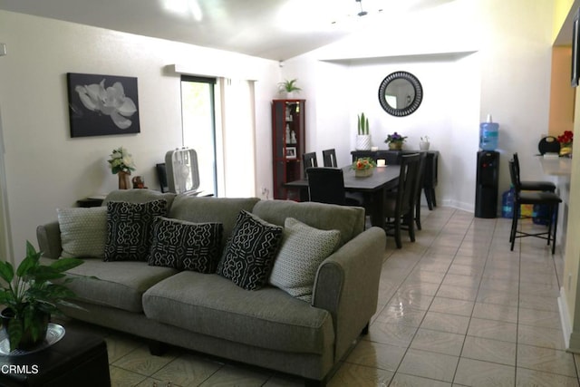 6232 Country View Ln, Riverside, CA 92504 - living area featuring vaulted ceiling and light tile patterned floors
