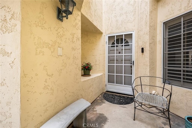503 Via Presa, San Clemente, CA 92672 - view of exterior entry with stucco siding and a patio area