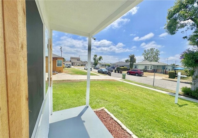 610 N Northwood Ave, Compton, CA 90220 - view of grassy yard featuring a residential view