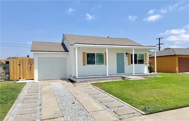 610 N Northwood Ave, Compton, CA 90220 - view of front of property featuring stucco siding, a garage, concrete driveway, a shingled roof, and a porch