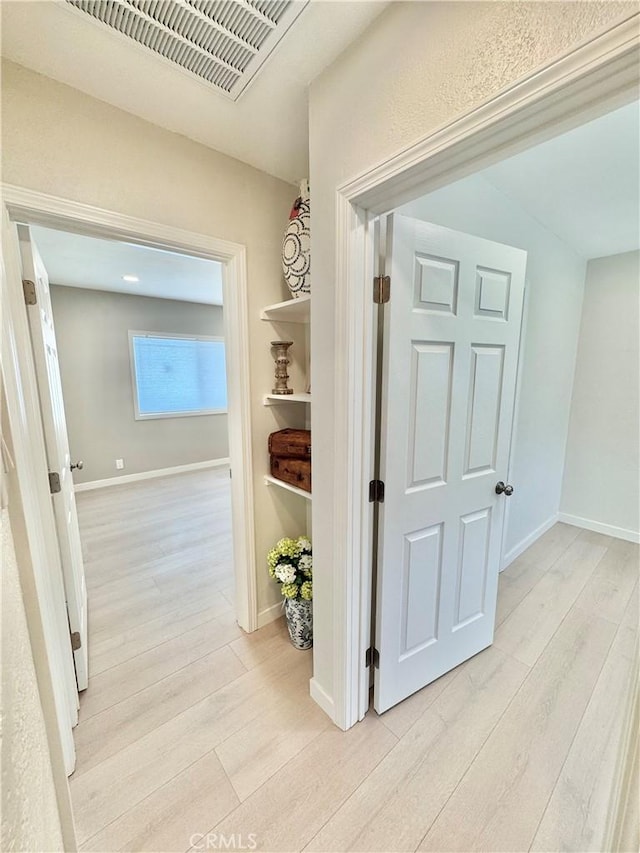 610 N Northwood Ave, Compton, CA 90220 - corridor with light wood finished floors