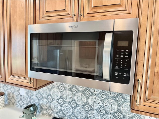 610 N Northwood Ave, Compton, CA 90220 - detailed view of stainless steel microwave and backsplash
