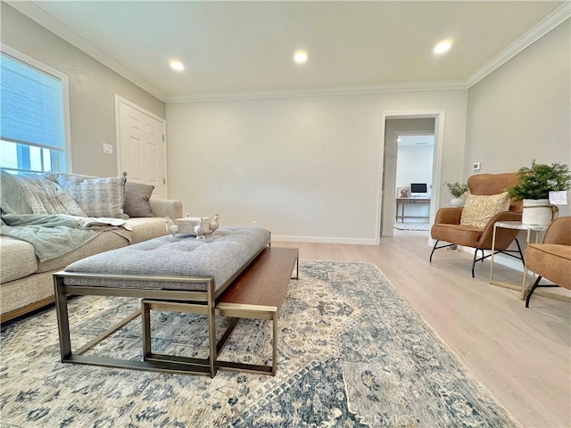 610 N Northwood Ave, Compton, CA 90220 - living room featuring light wood finished floors, ornamental molding, and recessed lighting