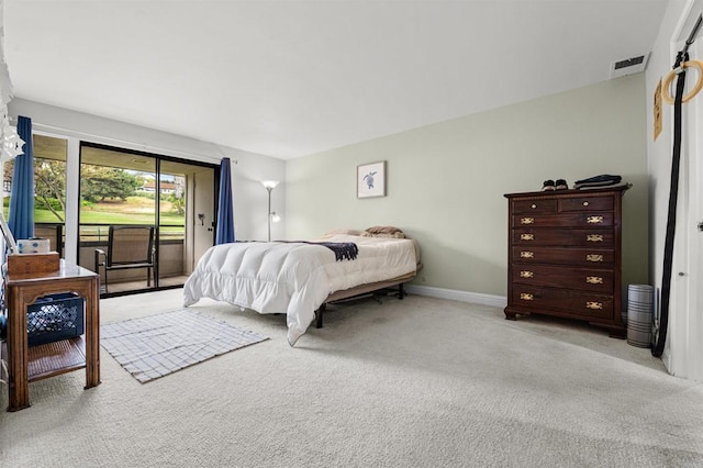 2537 Navarra Dr Unit 9B, Carlsbad, CA 92009 - bedroom with light colored carpet, access to outside, and baseboards