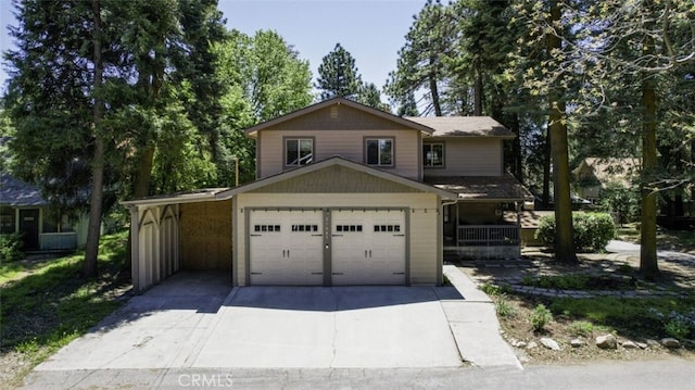 21645 Jobs Peak Rd, Cedarpines Park, CA 92322 - traditional-style home with driveway, an attached garage, and covered porch