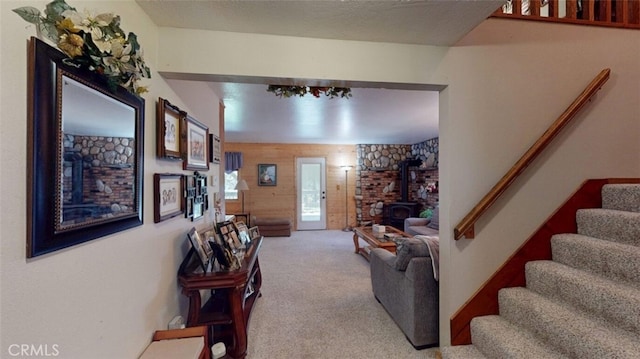 21645 Jobs Peak Rd, Cedarpines Park, CA 92322 - living area with a wood stove, stairway, and carpet flooring