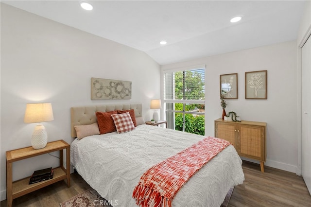 2900 S Greenville S Unit H, Santa Ana, CA 92704 - bedroom featuring wood finished floors, baseboards, recessed lighting, and lofted ceiling