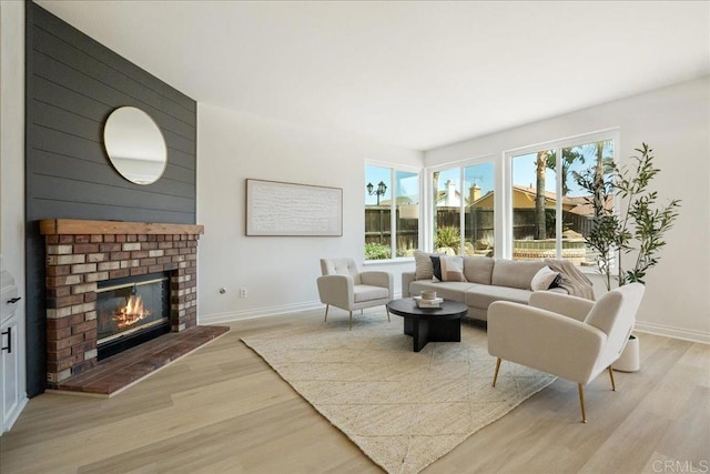29589 Hazel Glen Rd, Murrieta, CA 92563 - living area with light wood finished floors and a brick fireplace
